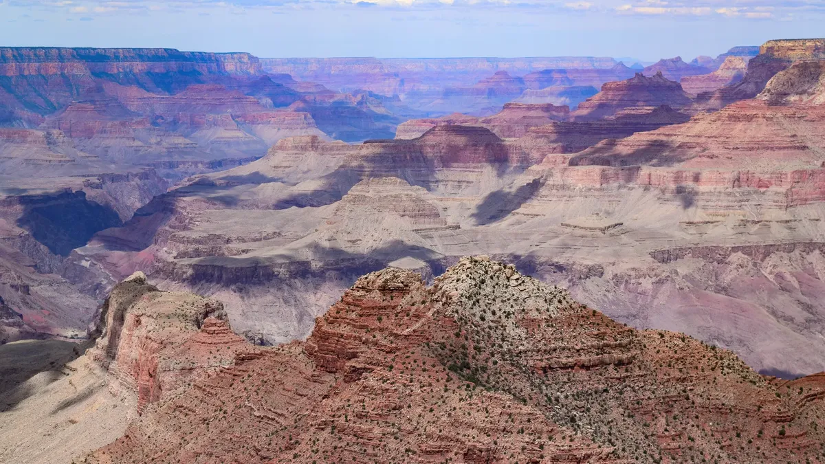 A breathtaking view of the Grand Canyon West showcasing vast cliffs and natural beauty.